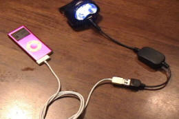 Charging iPod 2GB with EL8 Solar Energy Headlamp and USB adapter