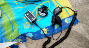 EL8 Headlamp Charging cell phone at the beach